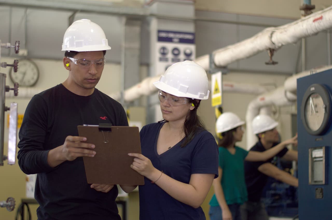 Industrial team using a field tool